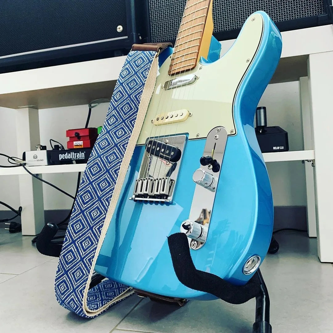 blue telecaster with retro ethno guitar strap