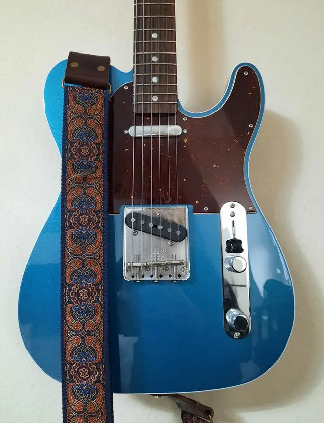 blue telecaster with retro guitar strap