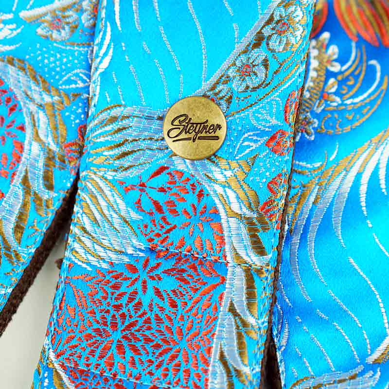 Gitarrengurt blau mit buntem Blumen Muster und gestickten Elementen