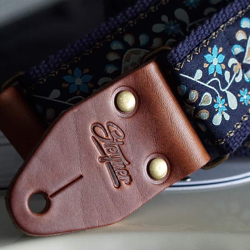 Retro Gitarrengurt mit Blumen Muster in blau Lederende