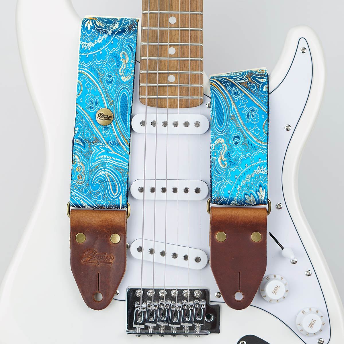 gitarrengurt blau mit muster paisley und weisser gitarre