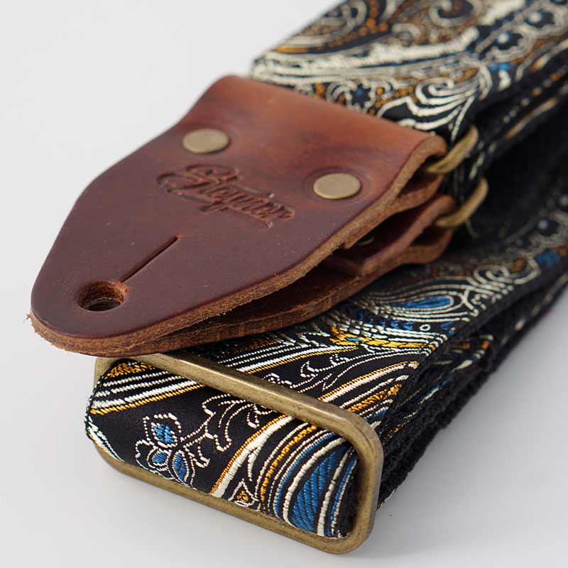 Schwarzer Gitarrengurt mit Paisley Muster und hochwertigem Rinds Leder