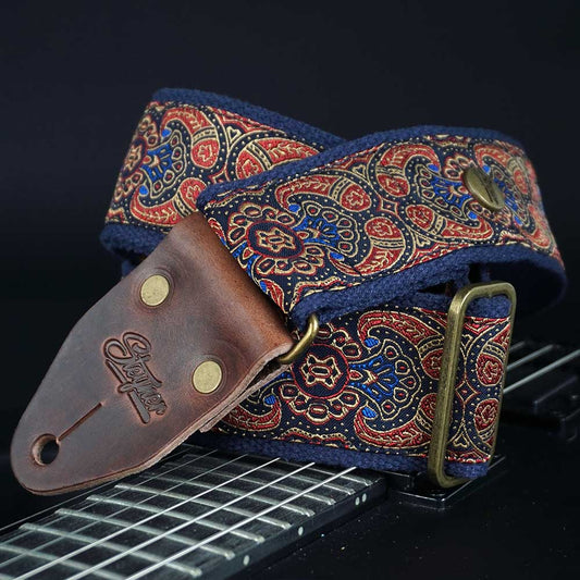 Gitarrengurt Retro Stil mit Paisley Muster auf einer schwarzen e gitare